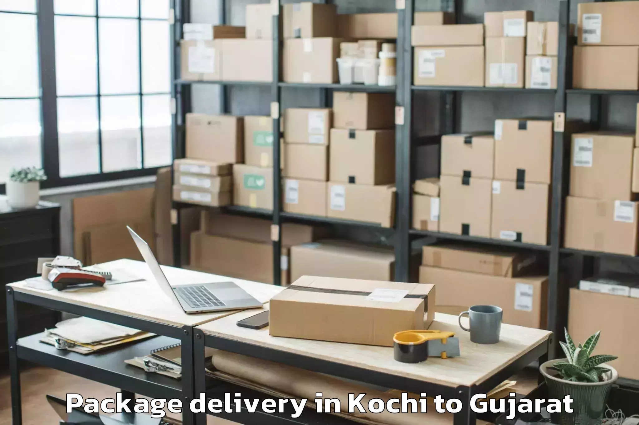 Easy Kochi to Crystal Mall Rajkot Package Delivery Booking